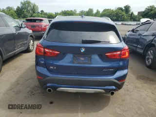 2021 BMW X1 xDrive28i with VIN WBXJG9C0XM5U47141, listed as a Copart auction lot 60645865 with 56,106 mi miles and Salvage title. Bid and sale history available at DreamBid. Image 6.