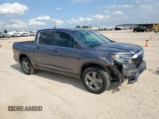 2023 Honda Ridgeline RTL z VIN 5FPYK3F54PB043289, wystawiony jako Copart lot #59173065 z przebiegiem 34 219 mil mil oraz Szkoda całkowita • Salvage title. Historia ofert i sprzedaży dostępna na DreamBid. Obrazek 4.