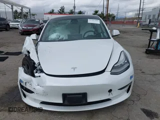 2021 Tesla Model 3 Long Range with VIN 5YJ3E1EB8MF860282, listed as a IAAI auction lot 41787008 with 49,730 mi miles and . Bid and sale history available at DreamBid. Image 12.