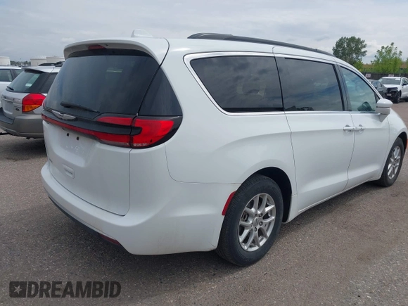 2022 Chrysler Pacifica Touring L with VIN 2C4RC1BG5NR170186, listed as a IAAI auction lot 41422057 with 71,204 mi miles and . Bid and sale history available at DreamBid. Image 4.