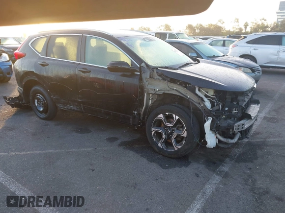 2019 Honda CR-V Touring with VIN 7FARW2H9XKE012394, listed as a IAAI auction lot 41092564 with 49,527 mi miles and . Bid and sale history available at DreamBid. Image 1.