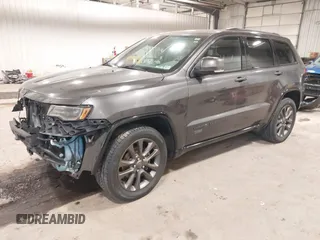 2016 Jeep Grand Cherokee Limited 75th Anniversary with VIN 1C4RJFBG2GC349154, listed as a IAAI auction lot 41392239 with 135,627 mi miles and . Bid and sale history available at DreamBid. Image 17.