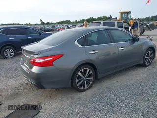 2016 Nissan Altima SR with VIN 1N4AL3AP2GC220196, listed as a IAAI auction lot 42362704 with 104,939 mi miles and . Bid and sale history available at DreamBid. Image 4.