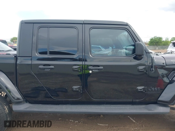 2021 Jeep Gladiator Freedom z VIN 1C6HJTAG4ML586999, wystawiony jako IAAI lot #41911751 z przebiegiem 81 030 mil mil oraz . Historia ofert i sprzedaży dostępna na DreamBid. Obrazek 13.
