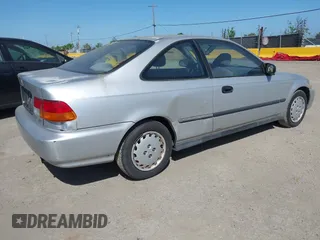 1997 Honda Civic DX with VIN 1HGEJ6220VL106203, listed as a IAAI auction lot 42098813 with 192,343 mi miles. Bid and sale history available at carsss.com. Image 4.