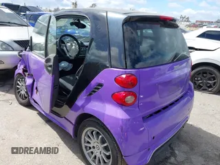 2013 Smart fortwo Pure with VIN WMEEJ3BA0DK686417, listed as a IAAI auction lot 41803956 with 83,850 mi miles. Bid and sale history available at carsss.com. Image 3.