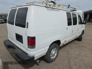 2012 Ford Econoline Cargo Commercial z VIN 1FTNE2EL7CDB36273, wystawiony jako IAAI lot #42408928 z przebiegiem 143 428 mil mil oraz . Historia ofert i sprzedaży dostępna na DreamBid. Obrazek 24.