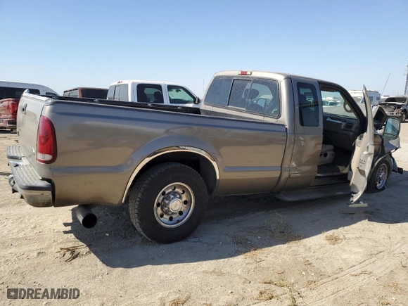 2002 Ford Super Duty F-250 XL with VIN 1FTNX20F12EA19230, listed as a Copart auction lot 74044634 with 392,488 mi miles and Salvage Title. Bid and sale history available at carsss.com. Image 3.