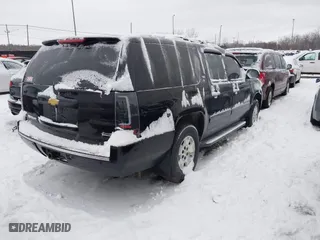 2012 Chevrolet Suburban LTZ with VIN 1GNSKKE75CR215742, listed as a IAAI auction lot 41236729 with 250,634 mi miles. Bid and sale history available at carsss.com. Image 4.