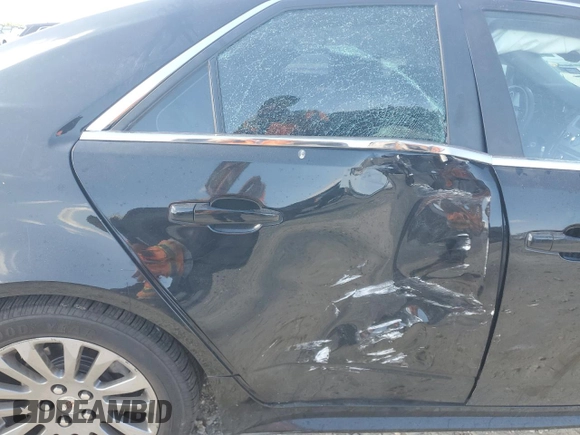 2011 Cadillac CTS Performance with VIN 1G6DJ5ED9B0164117, listed as a Copart auction lot 71833424 with 114,717 mi miles and Salvage Title. Bid and sale history available at DreamBid. Image 11.