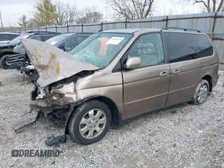2004 Honda Odyssey EX z VIN 5FNRL18634B004127, wystawiony jako IAAI lot #41854878 z przebiegiem 242 601 mil mil oraz . Historia ofert i sprzedaży dostępna na DreamBid. Obrazek 2.