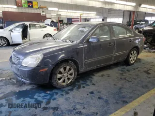 2007 Kia Optima EX with VIN KNAGE124275159540, listed as a Copart auction lot 46324655 with 184,036 mi miles and Salvage Title. Bid and sale history available at carsss.com. Image 1.