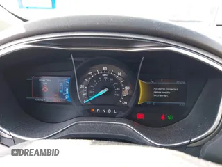 2014 Ford Fusion SE Hybrid with VIN 3FA6P0LUXER233658, listed as a IAAI auction lot 42311588 with 106,282 mi miles and . Bid and sale history available at DreamBid. Image 7.