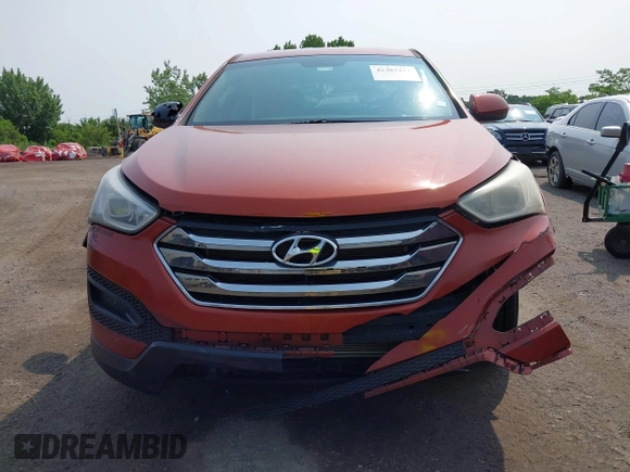 2014 Hyundai Santa Fe z VIN 5XYZTDLB0EG208769, wystawiony jako IAAI lot #42485411 z przebiegiem 82 173 mil mil oraz . Historia ofert i sprzedaży dostępna na DreamBid. Obrazek 12.