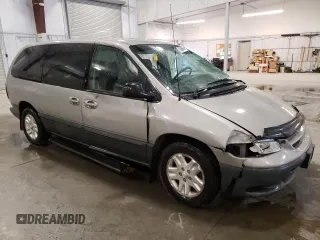 1996 Dodge Caravan LE with VIN 1B4GP54L7TB361937, listed as a Copart auction lot 71636564 with 186,812 mi miles and Salvage Title. Bid and sale history available at carsss.com. Image 4.