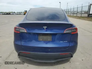 2021 Tesla Model Y Long Range with VIN 5YJYGDEE3MF094165, listed as a Copart auction lot 52907835 with 141,260 mi miles and Salvage Title. Bid and sale history available at DreamBid. Image 6.