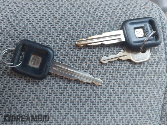 1995 Isuzu Rodeo z VIN 4S2CM58V5S4370553, wystawiony jako IAAI lot #42369256 z przebiegiem 198 946 mil mil oraz . Historia ofert i sprzedaży dostępna na DreamBid. Obrazek 11.