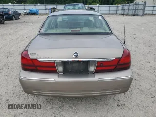 2005 Mercury Grand Marquis LS Premium z VIN 2MEFM75W15X660639, wystawiony jako Copart lot #56580605 z przebiegiem 149 136 mil mil oraz Szkody całkowita. Historia ofert i sprzedaży dostępna na DreamBid. Obrazek 6.