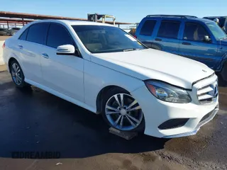 2014 Mercedes-Benz E-Class E 250 BlueTEC Luxury with VIN WDDHF0EB1EA873470, listed as a IAAI auction lot 41406978 with 98,515 mi miles. Bid and sale history available at carsss.com. Image 1.