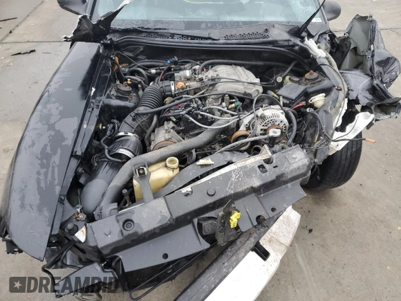 1997 Ford Mustang with VIN 1FALP4049VF136060, listed as a Copart auction lot 85389824 with 0 mi miles and Salvage Title. Bid and sale history available at carsss.com. Image 12.