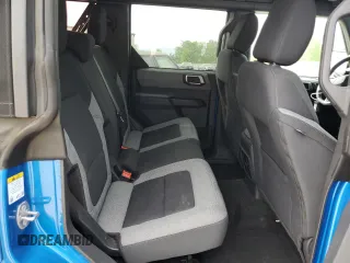 2023 Ford Bronco z VIN 1FMDE5BH7PLB11989, wystawiony jako Copart lot #58302125 z przebiegiem 25 526 mil mil oraz Szkoda całkowita • Salvage title. Historia ofert i sprzedaży dostępna na DreamBid. Obrazek 11.
