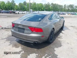 2012 Audi A7 Premium Plus with VIN WAUYGAFC1CN085666, listed as a IAAI auction lot 42177867 with 242,775 mi miles and . Bid and sale history available at DreamBid. Image 4.