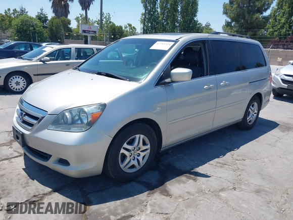 2005 Honda Odyssey EX-L with VIN 5FNRL38725B113815, listed as a IAAI auction lot 42754724 with 179,214 mi miles and . Bid and sale history available at DreamBid. Image 2.