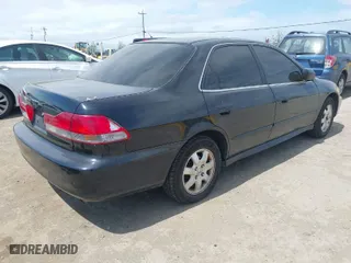 2002 Honda Accord Sdn SE with VIN 1HGCG66802A130514, listed as a IAAI auction lot 42053889 with 326,434 mi miles. Bid and sale history available at carsss.com. Image 4.