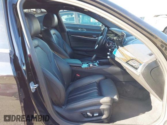 2019 BMW 5 Series 530e iPerformance with VIN WBAJA9C53KB388861, listed as a IAAI auction lot 41621712 with 68,128 mi miles. Bid and sale history available at carsss.com. Image 5.