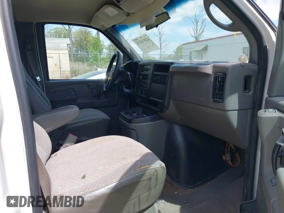 2005 Chevrolet Express Passenger with VIN 1GAHG35U051181753, listed as a IAAI auction lot 42074333 with 335,090 mi miles and . Bid and sale history available at DreamBid. Image 5.