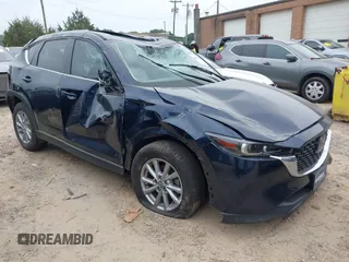 2023 Mazda CX-5 S Carbon Edition z VIN JM3KFBCM6P0251947, wystawiony jako IAAI lot #42286595 z przebiegiem 9434 mil mil oraz . Historia ofert i sprzedaży dostępna na DreamBid. Obrazek 1.