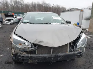 2015 Toyota Corolla L z VIN 2T1BURHE0FC468259, wystawiony jako IAAI lot #41559030 z przebiegiem 299 557 mil mil oraz . Historia ofert i sprzedaży dostępna na DreamBid. Obrazek 12.