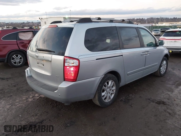 2007 Kia Sedona LX with VIN KNDMB233976172127, listed as a IAAI auction lot 41557356 with 164,383 mi miles. Bid and sale history available at carsss.com. Image 4.