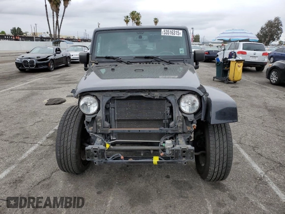 2015 Jeep Wrangler Sahara z VIN 1C4AJWBG2FL614702, wystawiony jako Copart lot #53516315 z przebiegiem 91 899 mil mil oraz Szkoda całkowita • Salvage title. Historia ofert i sprzedaży dostępna na DreamBid. Obrazek 5.
