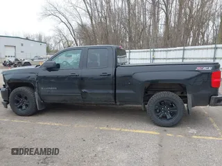 2016 Chevrolet Silverado 1500 LT with VIN 1GCVKREC5GZ354867, listed as a IAAI auction lot 41955455 with 164,971 mi miles. Bid and sale history available at carsss.com. Image 14.
