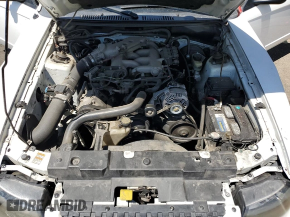 2000 Ford Mustang z VIN 1FAFP4045YF302687, wystawiony jako Copart lot #58044485 z przebiegiem 191 961 mil mil oraz Szkoda całkowita • Salvage title. Historia ofert i sprzedaży dostępna na DreamBid. Obrazek 11.