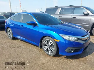 2016 Honda Civic EX-L z VIN 19XFC1F7XGE019863, wystawiony jako IAAI lot #42361161 z przebiegiem 118 907 mil mil oraz . Historia ofert i sprzedaży dostępna na DreamBid. Obrazek 1.