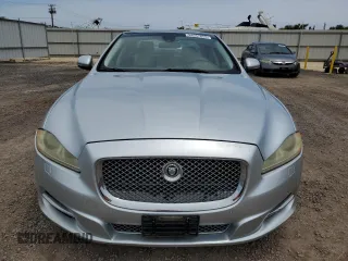 2011 Jaguar XJ with VIN SAJWA1CB9BLV05595, listed as a Copart auction lot 54947855 with 39,516 mi miles and Salvage title. Bid and sale history available at DreamBid. Image 5.