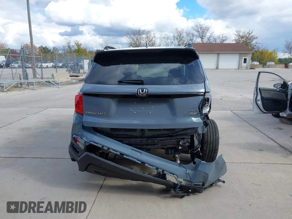 2023 Honda Passport Elite with VIN 5FNYF8H03PB000039, listed as a IAAI auction lot 40593339 with 33,697 mi miles and . Bid and sale history available at DreamBid. Image 16.
