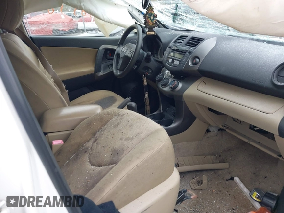 2009 Toyota RAV4 with VIN JTMBF33VX9D006796, listed as a IAAI auction lot 42058558 with 183,003 mi miles and . Bid and sale history available at DreamBid. Image 5.