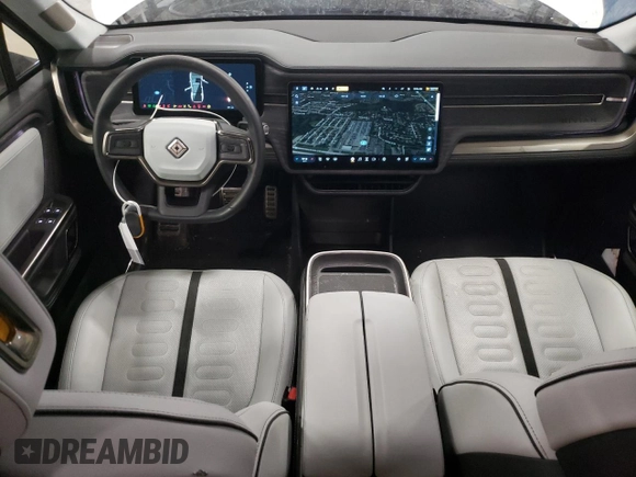 2023 Rivian R1S Adventure with VIN 7PDSGABA8PN014637, listed as a Copart auction lot 46277855 with 20,343 mi miles and Salvage Title. Bid and sale history available at DreamBid. Image 8.