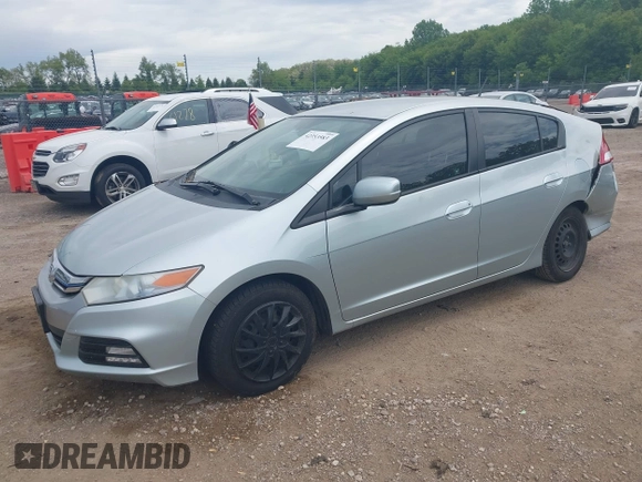 2012 Honda Insight LX with VIN JHMZE2H51CS002447, listed as a IAAI auction lot 42353583 with 179,377 mi miles and . Bid and sale history available at DreamBid. Image 2.