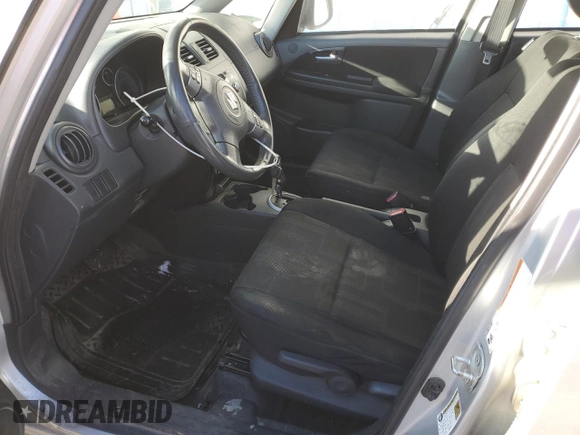 2010 Suzuki SX4 LE with VIN JS2YC5A27A6300498, listed as a Copart auction lot 43036655 with 237,647 mi miles and Salvage Title. Bid and sale history available at carsss.com. Image 7.