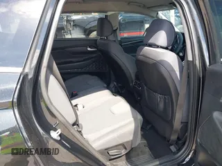 2021 Hyundai Santa Fe SE z VIN 5NMS14AJ0MH332918, wystawiony jako IAAI lot #42365534 z przebiegiem 58 720 mil mil oraz . Historia ofert i sprzedaży dostępna na DreamBid. Obrazek 8.