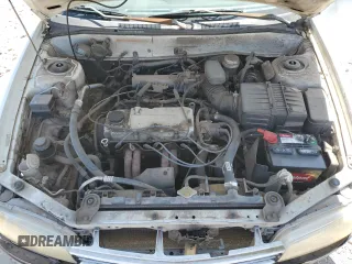 1998 Mitsubishi Mirage DE z VIN JA3AY26A1WU025398, wystawiony jako Copart lot #52533075 z przebiegiem 111 206 mil mil oraz Szkoda całkowita • Salvage title. Historia ofert i sprzedaży dostępna na DreamBid. Obrazek 13.