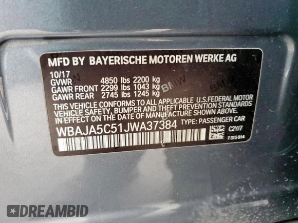 2018 BMW 5 Series 530i z VIN WBAJA5C51JWA37384, wystawiony jako Copart lot #55061215 z przebiegiem 113 809 mil mil oraz Szkody całkowita. Historia ofert i sprzedaży dostępna na DreamBid. Obrazek 12.