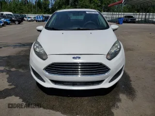 2019 Ford Fiesta SE z VIN 3FADP4BJ2KM147288, wystawiony jako Copart lot #55391125 z przebiegiem 83 887 mil mil oraz Szkoda całkowita • Salvage title. Historia ofert i sprzedaży dostępna na DreamBid. Obrazek 5.