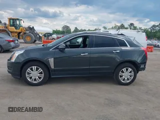 2014 Cadillac SRX Luxury Collection z VIN 3GYFNEE38ES626949, wystawiony jako IAAI lot #42194679 z przebiegiem 173 303 mil mil oraz . Historia ofert i sprzedaży dostępna na DreamBid. Obrazek 14.