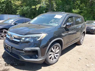 2019 Honda Pilot EX-L with VIN 5FNYF6H52KB006469, listed as a IAAI auction lot 42103135 with 12,757 mi miles and . Bid and sale history available at DreamBid. Image 18.