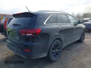 2020 Kia Sorento EX z VIN 5XYPHDA58LG708648, wystawiony jako IAAI lot #42022837 z przebiegiem 80 127 mil mil oraz . Historia ofert i sprzedaży dostępna na DreamBid. Obrazek 4.
